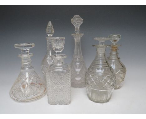 A COLLECTION OF SIX ASSORTED ANTIQUE AND VINTAGE GLASS DECANTERS