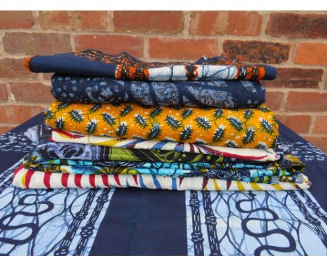 A COLLECTION OF MID CENTURY&nbsp;&amp; LATER&nbsp; AFRICAN ABSTRACT PRINT FABRIC / TEXTILE PANELS ETC, one labelled 'Oluba Ju