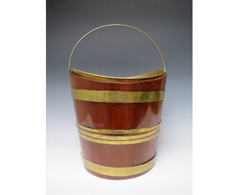 A 19TH CENTURY MAHOGANY BRASS BANDED PAIL, with swing handle, later liner and replacement bottom panel, H 33 cm, W 32 cm