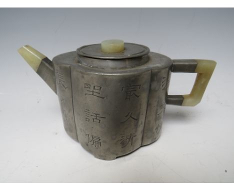 A PEWTER AND JADE ORIENTAL TEAPOT, with character marks to exterior panels and single internal character mark, W 17.2 cm, H 1