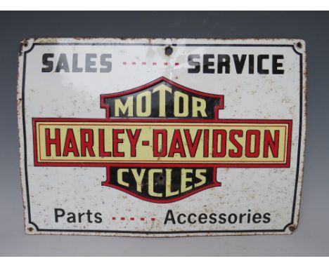 A VINTAGE 20TH CENTURY ENAMELED METAL SIGN FOR HARLEY DAVIDSON MOTORCYCLES, H 28 cm, W 39 cm
