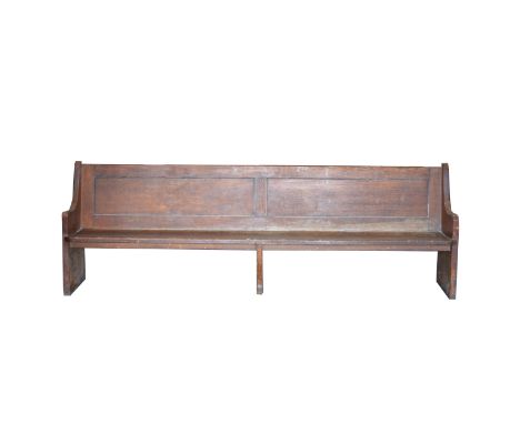 Oak bench, two rectangular panels to the back, boarded seat, standard ends, length 283cm, depth 45cm, height 95cm. Removed fr