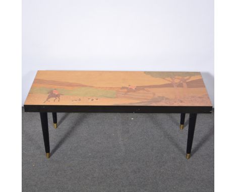 Marquetry coffee table, the top decorated with a hunting scene, turned legs, 102x41cm, height 41cm.