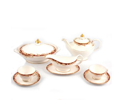 Royal Doulton 'Winthrop' pattern part dinner and tea service, comprising plates, bowls, lidded tureens, meat platters, gravy 