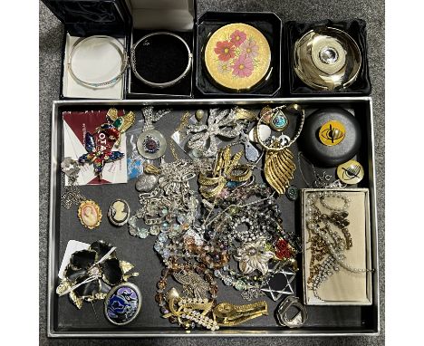 A collection of silver and costume jewellery, a silver 12mm wide half hinged bangle with engraved decoration to front; a mode