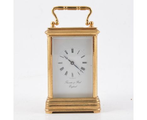 Brass cased carriage clock, gorge case, rectangular enamelled dial signed Thwaites &amp; Reed, non-striking movement, 13cm.