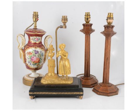 French ormolu figure, of a Shepherdess by an urn, serving as a table lamp base, with shade, overall 65cm; a Sevres style porc