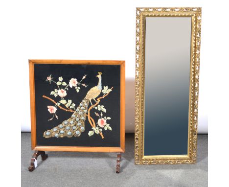 Wall mirror, gilt frame, 102x40cm, and a firescreen with tapestry inset panel.