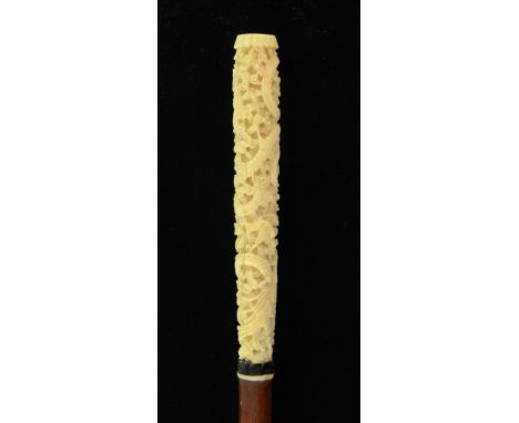 Cantonese carved Ivory walking stick depicting a dragon and Phoenix, 85cm