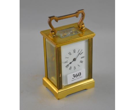 Brass and four glass carriage clock with lever movement,
