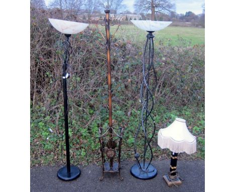 Two floor standing lamps, metal coat stand and a table lamp,