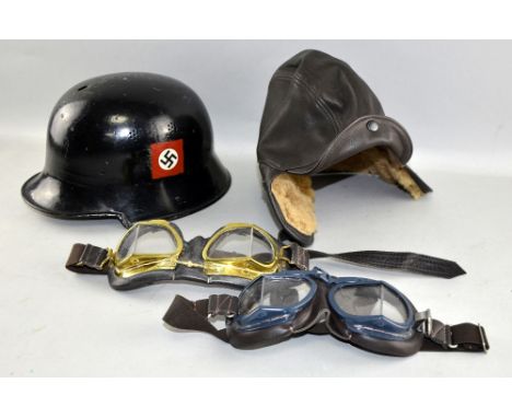 German Third Rich  tin helmet  two pairs of goggles and leather hat 