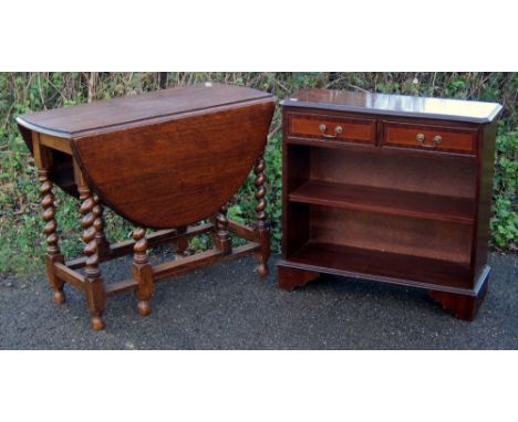 Oak gate leg table and a mahogany bookcase Provenance; Consigned for sale by David Myers following the recent fire at Bourne 