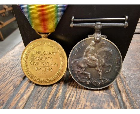 Pair of WW1 Army Service Medals for a Private E. Baume