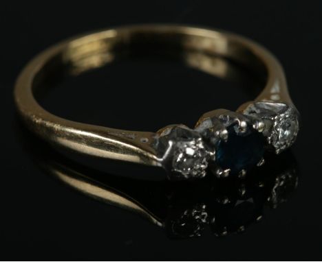 An 18ct gold &amp; platinum sapphire &amp; diamond ring. Size K. 2.2g.  