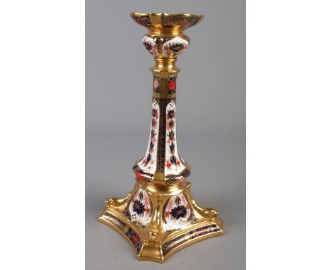 A Royal Crown Derby candlestick decorated in the Old Imari pattern, 1128. Height 27cm.  