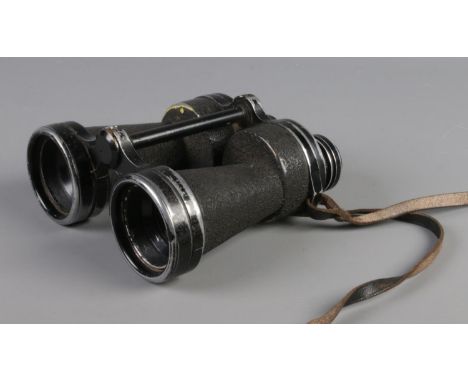 A pair of military Bino Prism Mark IV binoculars. Bearing broad arrow mark.  