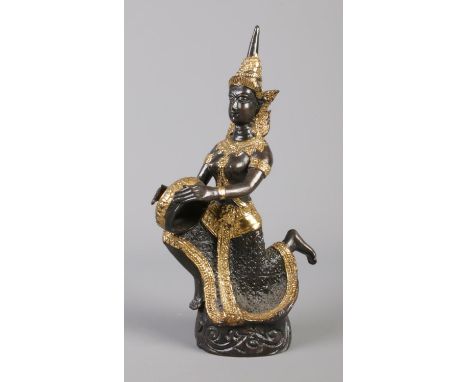 A cast bronze sculpture formed as a Thai musician, with gilt decoration. 19cm.  