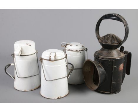 A vintage railway lamp along with three enamel Billy cans.  