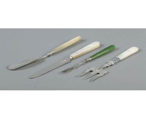 Four pieces of silver cutlery. Includes Georgian ice cream knife, Victorian toasting fork, fruit fork and a Walker &amp; Hall