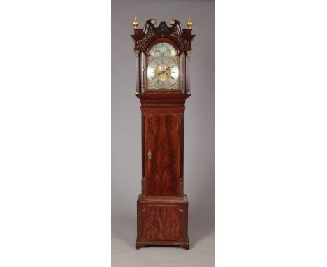 A Georgian mahogany eight day longcase clock by Thomas Ogden, Halifax. With twin swan neck pediment. Having painted moon phas