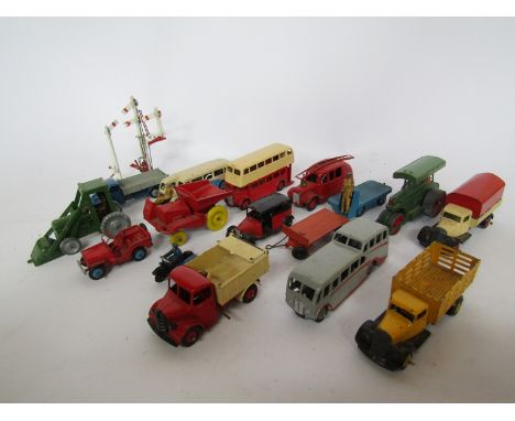 A collection of Dinky and other die-cast vehicles including motorbike and sidecar, buses, fire engine, etc