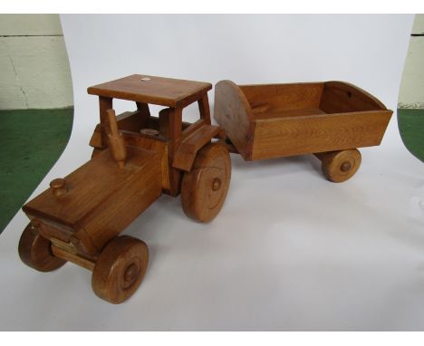A handmade oak tractor and tipping trailer with brass makers plaque