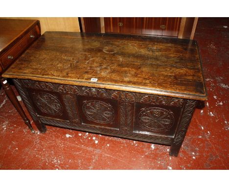 A 17th Century oak triple panel oak coffer 112cm wide