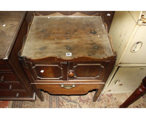 A George III mahogany tray top commode 57cm wide
