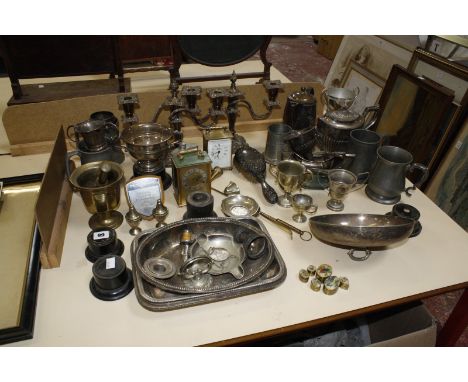 A quantity of silver plate items, to include a pair of two branch candelabra, a teapot, hot water jug, a wine funnel, two sma