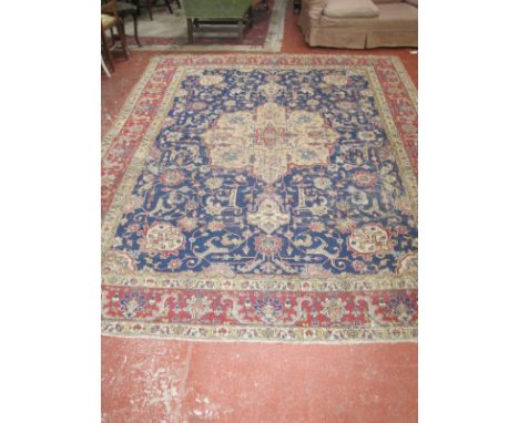 A Persian carpet approx 347 x 257cm