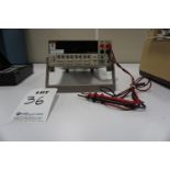 KEITHLY 2400 SOURCE METER, S/N 1238978, WITH POWER CABLE AND TESTERS