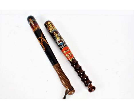 Two painted constabulary truncheons, one Victorian example depicting a crown and VR in gold with a leather wrist strap togeth