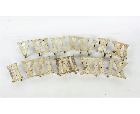 A Set of twelve 20th century clock golf Roman numerals, the metal numbers painted in white (12)