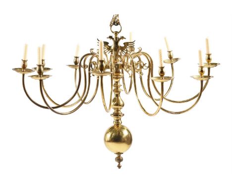 A BRASS CHANDELIER IN DUTCH 17TH CENTURY STYLELATE 19TH OR EARLY 20TH CENTURY AND LATERThe eagle finial above the 10 candle a