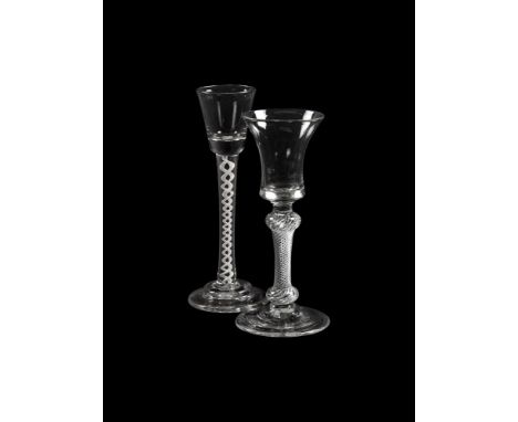 AN OPAQUE-TWIST CORDIAL GLASSTHIRD QUARTER 18TH CENTURYThe stem with a pair of spiral cables on a domed foot17cm highTogether