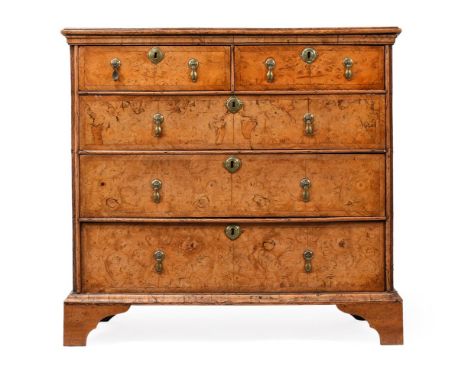 AN ELM AND BURR ELM CHEST OF DRAWERSEARLY 18TH CENTURY AND LATER92cm high, 98cm wide, 53cm deepCondition Report: Marks, knock