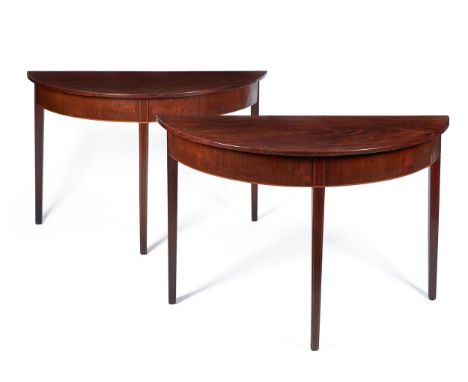 A PAIR OF MAHOGANY AND LINE INLAID CONSOLE TABLESLATE 18TH CENTURY AND LATEREach of semi-elliptical form, with a plain frieze