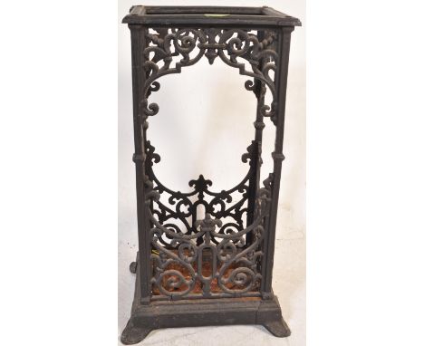 An early 20th century circa 1920’s cast iron stick stand / umbrella stand. The stand of a tall pedestal form decorated with f