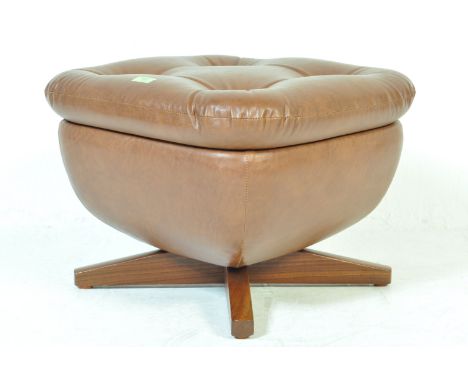 Parker Knoll - A retro vintage late 20th century footstool / pouffe having a chesterfield style buttons, upholstered in brown