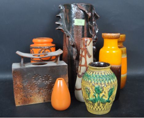 A collection of vintage retro mid 20th century studio pottery vases the collection include West German examples, Cornish stud