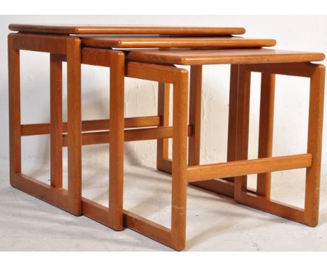 A vintage retro mid 20th century teak wood nest of tables by McIntosh of Kirkcaldy. The three graduated tables having a recta