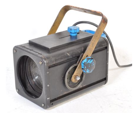 A retro vintage studio / theatre / cinema spotlight lamp in black colourway&nbsp; with adjustable focus on hanging brackets. 