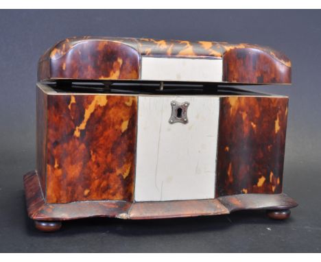 A Regency early 19th century tortoise shell and ivory tea caddy having a hinged lid with white metal plaque to the surface op