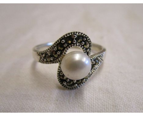 Silver pearl set ring