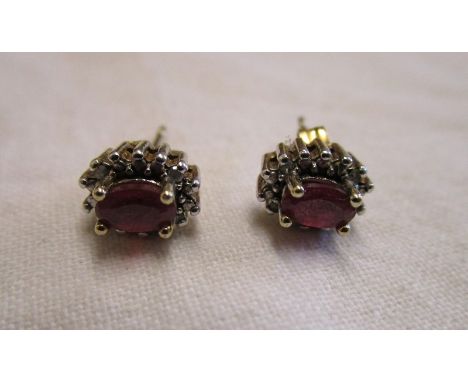 Ruby &amp; diamond set earrings