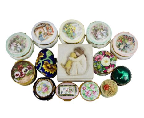 A collection of fourteen trinket and pill boxes, including examples by Royal Doulton, Halcyon Days, Limoges Castel etc..... (