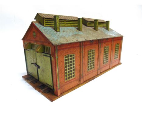 [O GAUGE]. A HORNBY NO.2, ENGINE SHED  the interior with two-rail track, generally playworn, unboxed. Condition Report : Stru