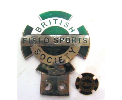 AUTOMOBILIA - A BRITISH FIELD SPORTS SOCIETY ENAMEL BAR BADGE  9.5cm high (enamel chipped and cracked, with loss); together w