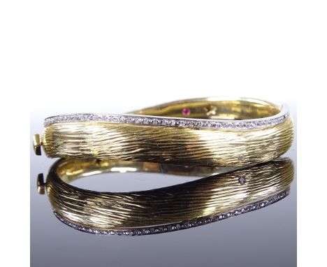 ROBERTO COIN - an Italian designer 2-tone 18ct gold and diamond Elefantino Collection hinged bangle bracelet, textured elepha